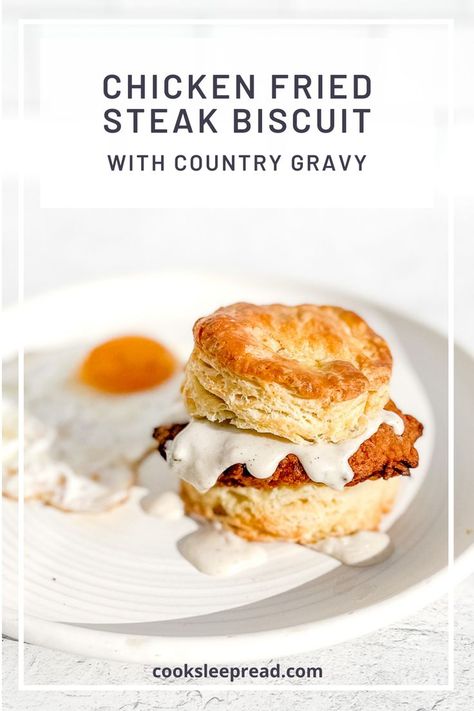 Chicken Fried Steak Biscuit with country gravy with a fried egg on a white plate. Steak Biscuits Breakfast, Chicken Gravy And Biscuits, Chicken Friend Steak, Steak Biscuits, Breakfast Biscuit Recipe, Breakfast Steak, Breakfast Gravy, Flaky Buttermilk Biscuits, Chicken Biscuits