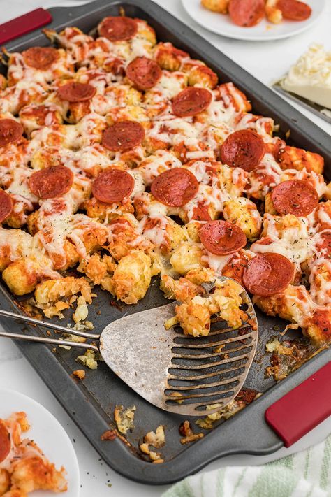 Cheesy Pizza Tater Tot Casserole - this simple meal is a hit every time and couldn't be easier with only five ingredients! Tater Tots Pizza, Tator Tot Pizza Casserole Recipe, Pizza Tator Tot Hotdish, Tator Tot Pizza Recipe, Tater Tot Pizza Casserole, Pizza Tater Tots, Tater Tot Pizza Recipes, Pizza Tots, Pizza Tater Tot Casserole