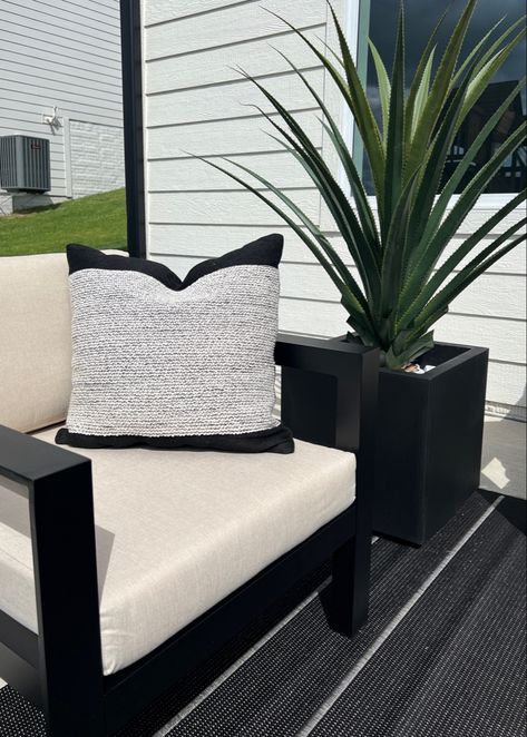 Black Deck Furniture Patio, Patio Decor Ideas, Black And Gray Patio Furniture, Black Patio Furniture With Throw Pillows, Front Porch Sitting Area, Black Outdoor Lounge Furniture, Patio Furniture Dark Grey Cushions, Black Patio Furniture, Modern Outdoor Rugs