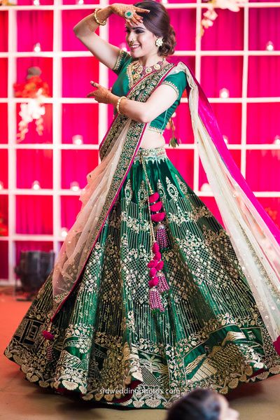 Sangeet / Engagement Lehengas - Bottle Green Lehenga with Golden Embroidery and Fuchsia Pink Detailing | WedMeGood #wedmegood #indianbride #indianwedding #lehengas #bridal #green #indianlehengas #gold #bottlegreen Sangeet Lehenga, Wedding Mehendi, Lehenga Bridal, Lehnga Dress, Indian Bridal Lehenga, Green Lehenga, Choli Designs, Indian Bridal Dress, Wedding Clothes