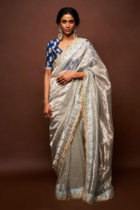 Buy Grey Tissue Embroidered Cutwork Scallop Trishi Border Saree With Blouse For Women by ISSA STUDIO BY CHETANA & SWATHI Online at Aza Fashions. Golden Saree With Blue Blouse, Contrast Blouse And Saree Combinations, Blouse With Grey Saree, Grey Saree Contrast Blouse, Blue Colour Saree With Contrast Blouse, Contrast Blouses For Silk Sarees, Grey Saree Blouse Combination, Golden Saree With Contrast Blouse, Blue Saree Contrast Blouse