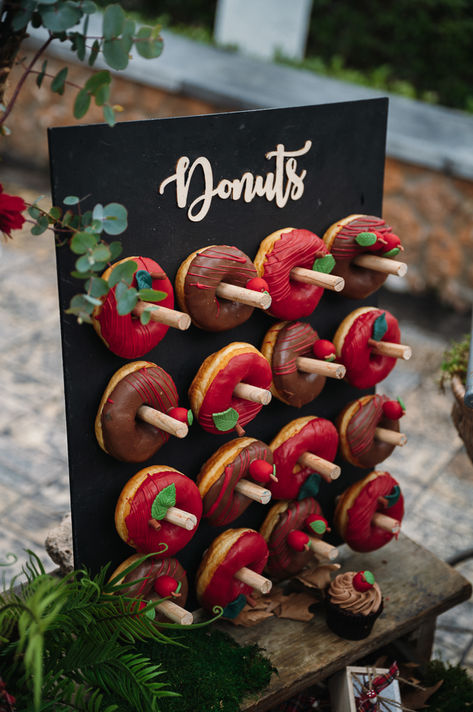 The Little Red Riding hood christening had custom made donuts and sweets, placed carefully on the candy bar. #littleredridinghood #christening #apples #event #eventplanner #design #designer #eventdesign #decoration #decor #christmasdecoration #themedevent #christeningday #classic #fairytale #fairytalethemed #candybar #mariaghikadecoration #mariaghika Red Riding Hood Party Decoration, Donuts Stand, Christmas Candy Bar, Red Riding Hood Party, Donut Stand, Snow White Birthday Party, Xmas Games, Christmas Buffet, Snow White Birthday