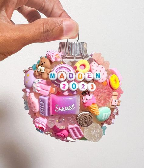 The cutest  ornaments you'll ever own.  This pastel colors, hand made Christmas ornament is unique and each is one of a kind. Adding a fun and whimsical magic to any room.  Add a whimsical touch to your holiday decor with our Personalized Charm Ornament🎄✨ This unique ornament is a delightful way to celebrate the season, featuring a collection of handpicked charms. Perfect as a memorable gift or a special addition to your own Christmas tree, this ornament will be cherished for years to come. Eac Personalized Holiday Gifts, Name Christmas Ornaments, Fall Festivities, Cozy Season, Christmas Ornaments Gifts, Kids Ornaments, Fall Gifts, Christmas Ornaments To Make, Custom Ornament