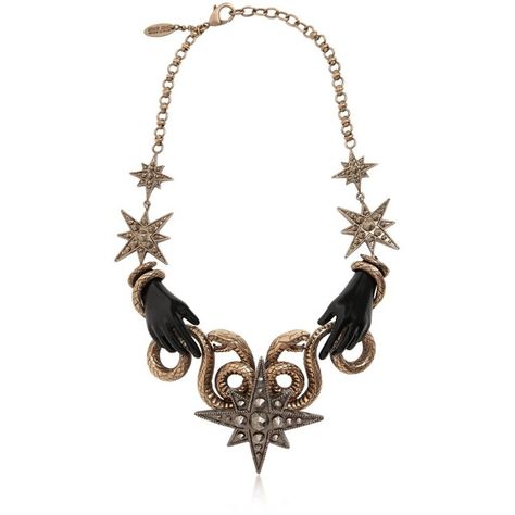 Roberto Cavalli Women Snake Star Brass Necklace (€1.375) ❤ liked on Polyvore featuring jewelry, necklaces, antique gold, star jewelry, brass necklace, roberto cavalli, gold tone jewelry and roberto cavalli jewelry