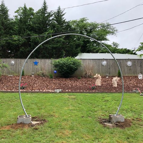 Newly installed moon gate, made from a recycled trampoline. Day One. Trampoline Garden Arch, Moon Gate Trampoline, Moon Gate Diy Trampoline, Trampoline Archway, Recycle Trampoline Ideas, Moon Door Garden Diy, Moongate Trampoline, Moongate Garden Diy, Garden Moon Gate Diy