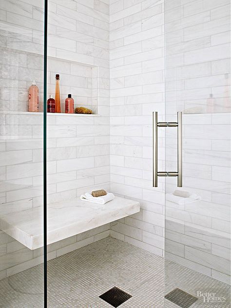 Instead of installing a weighty shower bench in your walk-in shower, opt for a sleek floating seat that doesn't clutter up the interior. Appearing to seamlessly jut out from the rear shower wall, this thick marble ledge tiptoes into view beneath a toiletry niche that mirrors the shower seat's horizontal silhouette./ Walk In Shower Designs, Shower Seat, Luxury Shower, Master Bath Remodel, Shower Bench, Shower Niche, Shower Seats, Bad Design, Corner Shower