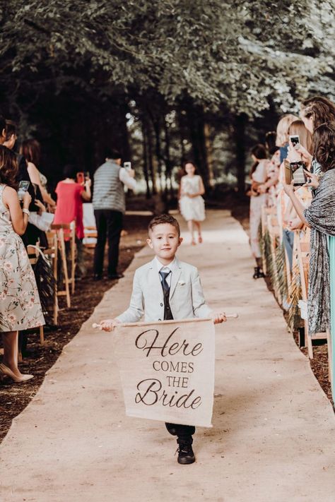 Page boy walking down the aisle with here comes the bride sign at Charisworth Farm wedding Page Boy Signs, Here Comes The Bride Sign, Wedding Photography Shot List, Wedding Touches, Bride Sign, Diy Wedding Planning, Boy Walking, Boy Sign, Pinterest Wedding