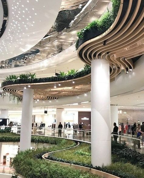 Galeries Lafayette Shanghai is known worldwide for its eye-catching integration of biophilic design into commercial space. Each floor is lined with deep planted beds mimicking meadows as they wind their way around the retail units. Simply put this is not your average shopping centre   via @pinterest . . . . . . . #plantdesigns #galerieslafayette #biophilia #biophilicdesign #architecture #architectureporn #natureatwork  #architecturelovers #architecturephotography #archilovers #archilover #arquit Mos Wand, Shopping Mall Interior, Shopping Mall Design, Mall Design, Shenyang, Modern Office Design, Ceiling Ideas, Green Architecture, Retail Interior