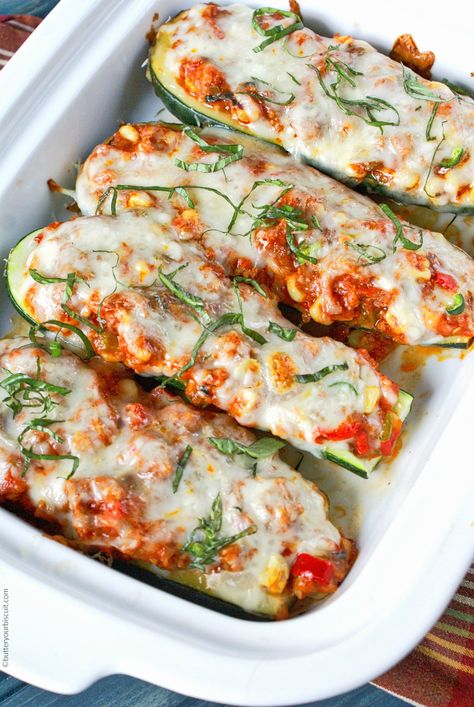 Summer wouldn't be the same without these hollowed out zucchini boats filled with sausage, peppers and cheese. A great way to use up all the extra zucchini. Chicken Parmesan Zucchini Boats, Zucchini Boat Recipes, High Protein Dinner, Protein Dinner, Ground Chicken Recipes, Stuffed Zucchini, Chicken Zucchini, Zucchini Boats, Lean And Green Meals