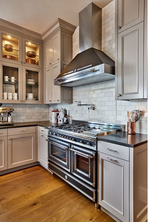 Gray cabinets to ceiling. Love this tile to ceiling also. From Beautiful Family Home with Traditional Interiors Grey Stained Kitchen Cabinets, Backsplash Herringbone, Stained Kitchen Cabinets, Dark Countertops, Traditional Interior Design, Grey Cabinets, Grey Kitchens, Kitchen Redo, Grey Kitchen