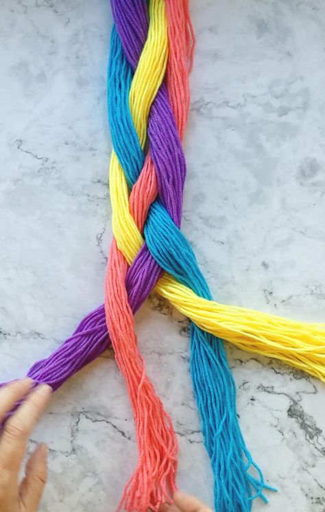 hands braiding a four strand braid Four Strand Braid, Four Braid, Four Strand Braids, Plait Braid, 4 Strand Braids, 4 Braids, How To Braid, Unique Braids, Yarn Braids