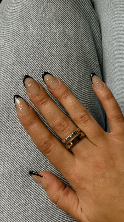 Black French Tip With Gold Stars, Black French Tip Pearl Nails, Black Metallic French Tip Nails, French Tip Celestial Nails, Black French Tip Nails With Gold Stars, Cute Black And Silver Nails, New Year Nails Black And Silver, Nail Inspo Black Design, Black French Tip With White Stars