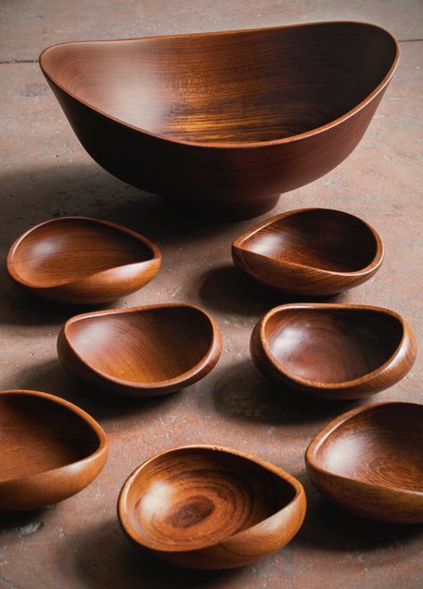 Finn Juhl SEVEN BOWLS comprising one large salad bowl, six small bowls and a pair of tongs large bowl impressed DESIGN/FINN JUHL/TEAK/KAY BOJESEN/DENMARK, all smaller bowls with variations of this impression teak large bowl: 6 3/4 x 14 1/2 x 13 in. (17.2 x 36.8 x 33 in.) smaller bowls: 2 1/4 x 6 in. (5.7 x 15.2 cm.) circa 1951 produced by Kay Bojesen, Copenhagen, Denmark Wooden Kitchenware, Wood Dishes, Wooden Dishes, Finn Juhl, Wooden Kitchen Utensils, Wood Turning Projects, Wooden Utensils, Wooden Plates, Wooden Kitchen