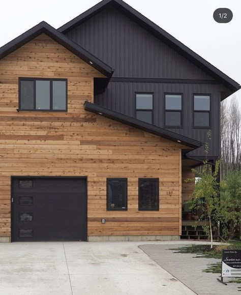 Gray And Wood House Exterior, Wood And Metal House Exterior, Black And Natural Wood Exterior, Black Wood Exterior House, Natural Wood Exterior Accents, New Tech Wood Siding, Black House Wood Trim, Black Home Exterior With Wood Accents, Black And Wood Home Exterior