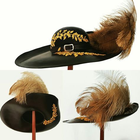 Luxurious leather wide brimmed pirate king hat decorated with gold leaf pattern appliqués, leather hat band with gold stitching and brass buckle, and gold ostrich feathers. https://m.facebook.com/TheCaptainsQuarters01/ Rain Witch, 1600s Fashion, Oktoberfest Hat, King Hat, German Oktoberfest, Tea Hats, Pirate Outfit, Pirate King, Wide Brim Hats