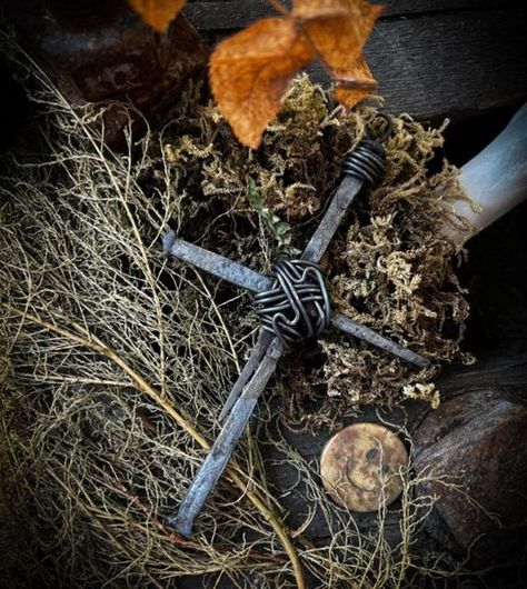 Lin Lytton 🇮🇪 Ireland ☘️ on Instagram: "These are popular this season 🦇 Available in shop now - made to order so will vary slightly Protection 1700’s Coffin Nail Crucifix Brutalist Crust Punk Pagan Pendant Necklace Talisman Wasteland Dystopian Gothic Wicca Wiccan Witch 3 vintage blacksmith coffin nail formed into a crucifix with protective iron wire wrapped around its mid section. Comes on a chain or leather cord of your choice. Measures 10cm in lenght. Coffin nails are very protective. Pagan Pendants, Brass Chain Necklace, Crust Punk, Wiccan Witch, Gothic Witch, Witch Jewelry, Nail Forms, Rustic Jewelry, Iron Wire