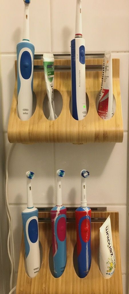 Electric toothbrush holder: An IKEA & Oral-B marriage  ﻿ Keep your bathroom sink free from toothbrushes and paste. Hack this easy and affordable electric toothbrush holder. Diy Toothbrush Holder Bathroom Ideas, Electric Toothbrush Storage Bathroom, Ikea Hack Bathroom, Diy Toothbrush Holder, Interior Hacks, Electric Toothbrush Storage, Diy Toothbrush, Raskog Cart, Teen Bathrooms