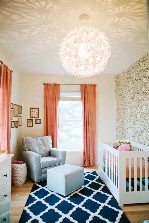 i like the light fixture. coral color. wall paper. the rug is probably too contrasting for me since there isn't navy elsewhere Chic Nursery, Baby Room Design, Nursery Baby Room, Beige Carpet, Nursery Colors, Gender Neutral Nursery, Nursery Inspiration, Baby's Room