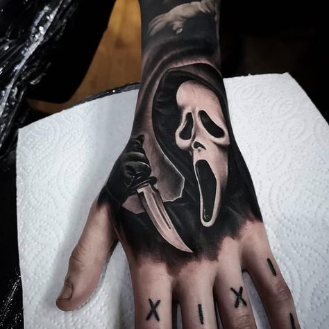 Ghost Face Finger Tattoo, Face Hand Tattoos For Guys, Horror Movie Hand Tattoos, Scream Hand Tattoo, Ghost Face Hand Tattoo, Horror Hand Tattoos, Django Tattoo, Slasher Tattoo, Ghost Face Tattoo