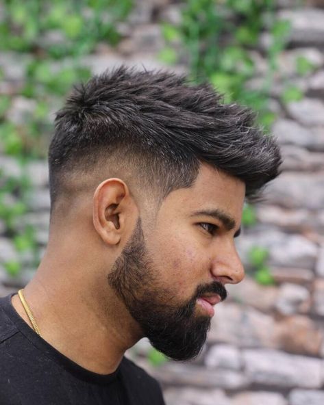 A bearded man with a short drop fade haircut, presenting a contemporary and polished look. Low Fade Hair, Mid Drop Fade, Low Fades, Messy Fringe, Drop Fade Haircut, Fade Hair, Drop Fade, Low Fade, Faded Hair