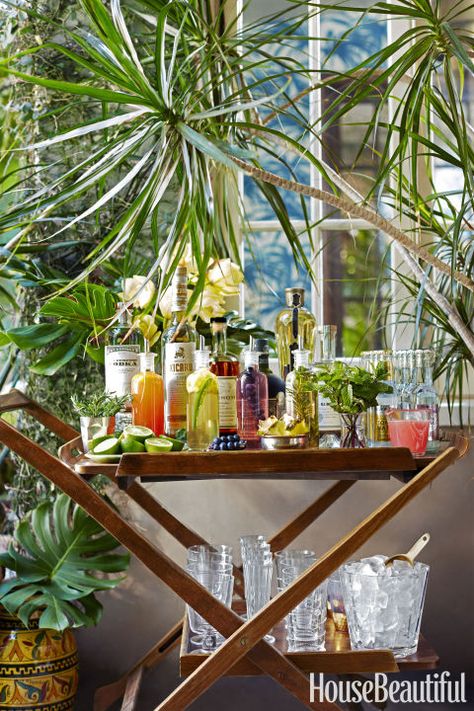 Stock the cart with small-batch flavored simple syrups in addition to top-shelf liquors, mixers and garnishes. Then just mix and match for bartender-status drinks. Click through for more summer party ideas and details that make a difference. Bandeja Bar, Entertaining Tips, Bar Cart Styling, Serving Cart, Bar Styling, Brunch Party, Backyard Party, Bar Carts, Summer Parties