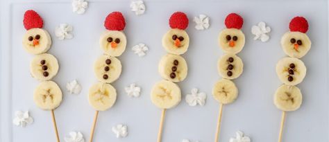 Banana Snowmen - Joy Bauer Hummus Wreath, Caprese Candy Cane, Joy Bauer Recipes, Fun Holiday Food, Ornamental Cherry, Diy Hanukkah, Joy Bauer, Snow People, Chocolate Coins