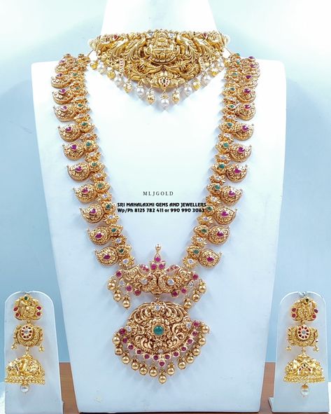 Best Designs In Your Choice Of Weight Presenting Latest Collection Of Nakshi Bridal Set Of Choker, Mango Haram and Jhumka Get 100% exchange value on your old Gold. Testing machine available Visit Us For Complete Range At Most Competitive Prices Instant Video Call On 8125782411 or 9909903063 Free Shipping Within India and U.S.A. #necklace #nakshijewellery #mangoharam #jhumkas #bridaljewellery #mljgold #srimahalaxmigemsandjewellers #generalbazar #Secunderabad #freeshippingusa Latest Mango Haram Designs, Mango Haaram Designs Gold Latest, Latest Long Harams Gold, Mango Mala Jewellery Gold Latest, Nakshi Mango Haram Designs, Choker And Long Haram Set Gold, Latest Mango Haram Designs With Grams, Haram And Necklace Set Gold, 80 Grams Gold Haram Designs