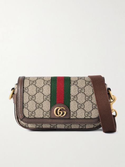 First introduced in 2018, Gucci's 'Ophidia' bag quickly became a fashion staple. This style is crafted from coated-canvas detailed with the label’s signature 'GG' monogram and trimmed with leather and striped webbing. It has an internal zipped pocket for smaller items and an adjustable shoulder strap, should you want to carry it cross-body. Messenger Bag For Men, Gucci Collection, Trendy Fits, Gucci Ophidia, Gg Monogram, Lv Bags, Canvas Messenger Bag, Messenger Bag Men, Gucci Accessories