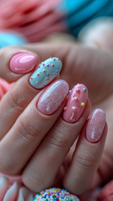 Experience a delightful getaway with our Pink Nails: Candy-themed assortment! From tempting lollipops to mouthwatering candies, these nail patterns are sure to appease your cravings for sweetness. Embrace the whimsical allure of candy-coated nails and infuse a hint of sugary charm into your look. Let your nails gleam with sugary bliss and immerse yourself in the enchanting realm of confectionery chic. #PinkNails #NailArt Sweets Nail Art, Sprinkles Nail Art, Sugar Cookie Nails, Pink Candy Nails, Candy Charm Nails, Candy Land Nails, Sprinkles Nails, Candy Nail Art, Sprinkle Nails