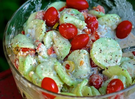 Print Friendly Version I made a bunch of fresh salads for our 4th of July celebration this year and decided to include this yummy favorite. It’s seriously amazing! Grandma’s Creamy Italian Cucumber Salad is just as easy to make as her traditional, classic cucumber salad, but with an Italian twist. We love the addition of…Read more → Creamy Italian Cucumber Salad, Italian Cucumber Salad, Creamy Italian Dressing, Cucumber Salad Recipe, Creamy Cucumber Salad, Creamy Cucumbers, Cucumber Tomato Salad, Cucumber Recipes Salad, Cucumber Recipes