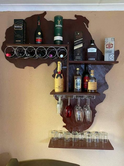 Display rack that's shaped as the African continent Whiskey Display, Shelves Design, Dark Living Rooms, Movies 2014, Shape Books, African Continent, Mini Doll House, Wall Shelves Design, Bed Furniture Design