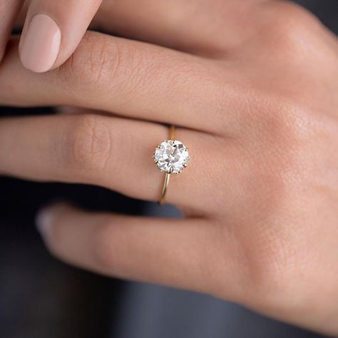 Timeless 14k Gold Diamond Ring With Accents, Timeless 14k Gold Cluster Ring With Diamond Cut, Timeless 14k Gold Diamond Ring Vs Clarity, Vintage Gold Cluster Ring With Prong Setting, Minimal Engagement Ring Melanie Casey Fine Jewelry, Round Solitaire Rings, Dainty Engagement, Round Moissanite Engagement Ring, Dainty Engagement Rings