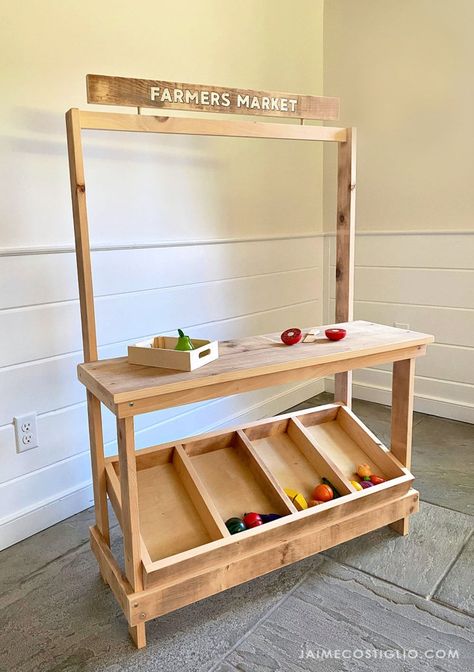 A DIY tutorial to build a kids play market stand. Make this generous sizes kids play stand perfect for all things pretend play. Play Market Stand, Dramatic Play Diy, Toy Library, Diy Kids Playground, Upcycle Kids, Farmers Market Stand, Witch Hut, Black Chalkboard Paint, Produce Stand