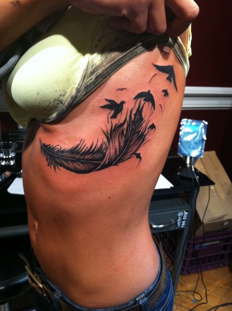 Leaf Tattoo Under Breast, Cover Up Tattoos Underboob, Feather Tattoos Underboob, Underboob Cover Up Tattoo, Rib Tattoos For Women Cover Up, Feather Back Tattoo, Underboob Tattoo Coverup, Feather Underboob Tattoo, Name Cover Up Tattoos