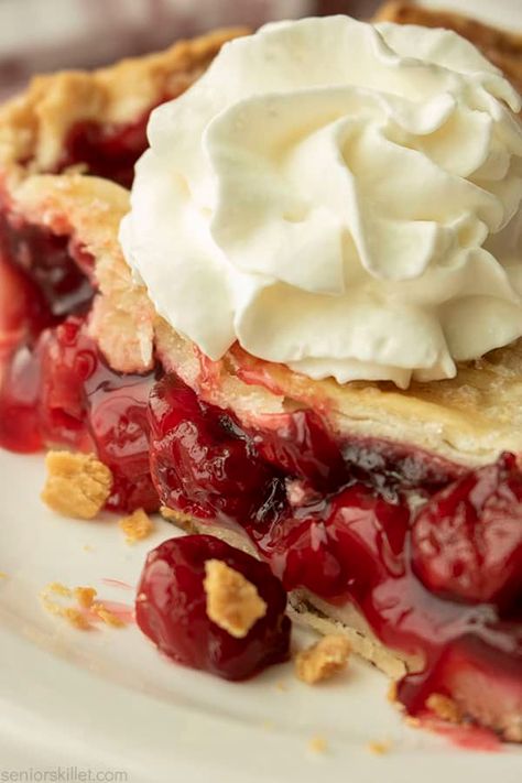 Skillet Lattice Cherry Pie is a scrumptious homemade cherry pie baked in a cast iron skillet. The ideal Homemade Southern Cherry dish, that is as delightful to look at as it is to eat. Bing Cherry Pie, Homemade Blueberry Pie, Flaky Pie Crust Recipe, Homemade Cherry Pies, Cherry Pie Recipe, Canning Cherry Pie Filling, Canned Cherries, Cherry Desserts, Homemade Pie Crusts