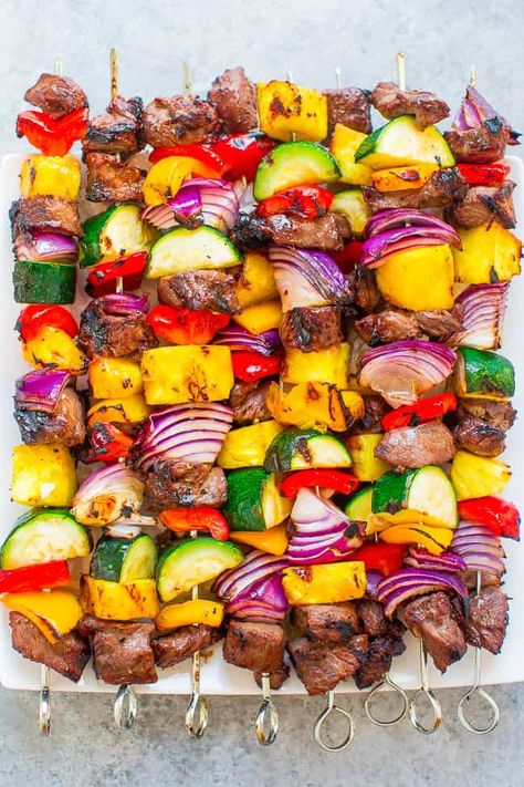 Juicy grilled steak kabobs with sweet bell peppers, onions, zucchini, and pineapple!! Fast, EASY, zero cleanup, and DELISH!! Skewers In The Oven, Veggie Steak, Grilled Steak Kabobs, Grilled Kabob Recipes, Grilling Kabobs, Steak Kabobs, Averie Cooks, Bbq Skewers, Grilled Steak Recipes