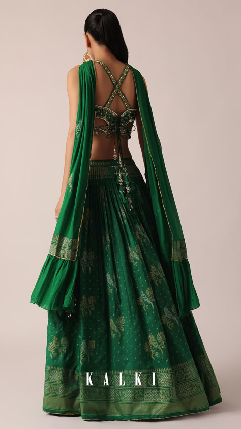 Exude understated glamour in this ethereal lehenga set. Decked with cutdana, mirror, pearls, sequin, and thread work, the lehenga comes crafted in luxe silk. Enhanced with captivating prints, it is paired with a sleeveless, V-neck blouse and a stylish dupatta. Ideal for grandeur weddings, this ensemble will ensure a head-turning entrance. Varun Bahl Lehenga, Navarati Dress, Green Silk Lehenga, Stylish Dupatta, Rakhi 2024, Varun Bahl, Mother Dearest, Understated Glamour, Blouse Embroidery