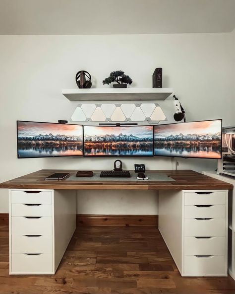 Triple Monitor Work & Play Setup ⚪️ What’s Your Favourite Part of This Setup? 🖥 ⁣ Comment Down Below Your Thoughts on This Setup and What’s One Thing You Would Add/Remove From It?⁣ #gamingmonitor #setupsforgaming #pcgram #rgblighting #pcbuilding #gamingnation #pcmod #extremegaming #liquidcooling #custompcbuild #pcmods #nzxt #gamingrig #battlestation #pcgamingsetup #custompc #workstation #razer #pcbuild #pcgaming #gamingsetup #gaminglife #instagaming #instagamer #setup #workspace #rgb Workspace Setup, Best Gaming Setup, Hide Cables, Pc Gaming Setup, Resident Evil 2, Gaming Station, Elder Scrolls Online, Custom Pc, Gaming Room Setup