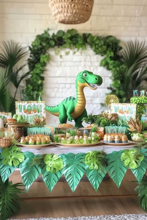 Dinosaur birthday idea Dinosaur Birthday Party Food Table, Dinasour Party Theme Ideas, Dinosaur Birthday Party Table Decor, The Good Dinosaur Party Ideas, Dinosaur Party Ideas Decorations, Dinosaur Themed Birthday Party Decorations, Dinasour Birthday Ideas, Diy Dinosaur Decor, Dino Party Ideas