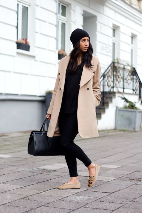 Shop this look on Lookastic:  https://lookastic.com/women/looks/coat-crew-neck-t-shirt-skinny-pants/14244  — Black Beanie  — Black Crew-neck T-shirt  — Beige Coat  — Black Leather Satchel Bag  — Black Velvet Skinny Pants  — Beige Leopard Suede Loafers Beige Loafers Outfit, Black And Camel Outfit, Loafers Outfit Women, Loafers Outfits, Winter Coat Trends, Camel Outfit, Beige Loafers, Pijamas Women, Loafers Outfit