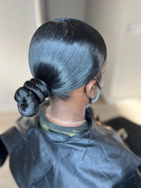 Sleek low knot bun with a side part. Black girl low knot bun. Sleek ponytail hairstyle Knot Bun Low, Low Bun Ponytail Black Hair, Sleek Low Knot Bun, Low Top Knot Bun, Low Buns Black Women, Side Part Low Knot Bun, Low Bun Middle Part Black Women, Low Knot Bun With Swoop, Swoop Knot Bun