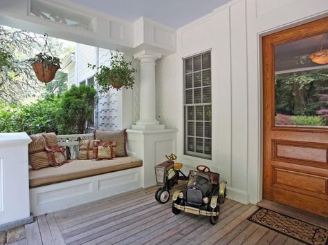 Cozy up to the front porch with a built-in bench seat perfect for keeping an eye on playful tikes. Front Porch Bench, Accessories Pictures, Porch Kits, Traditional Porch, Porch Bench, Pulte Homes, Building A Porch, Home Improvement Loans, Glass Panel Door