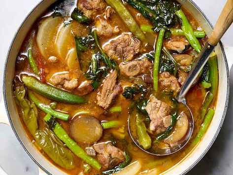 Sinigang na Baboy Recipe (Filipino Tamarind Soup with Pork and Vegetables) | The Kitchn Sinigang Na Baboy Recipe, Filipino Dinner, Filipino Soup Recipes, Tamarind Soup, Sinigang Recipe, Filipino Soup, Soup With Pork, Pork Spareribs, Garlic Fried Rice