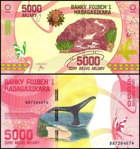 Madagascar 5,000 Ariary, 2017 ND. The banknote is colored in red and yellow with a few hints of green. Its obverse side contains Malagasy text, a flower printed with optically-variable ink, and a birds eye view of the waterfall in Ranomafana Park. Its reverse side depicts the tail of a humpback whale peeking out near the shoreline. Available at www.banknoteworld.com SKU: MADA102U #Madagascar #Africa #Banknote #Currency #PaperMoney #Numismatic Famous Black, Humpback Whale, Great Conversation Starters, Birds Eye View, Red And Yellow, Birds Eye, Paper Money, Bank Notes, Madagascar