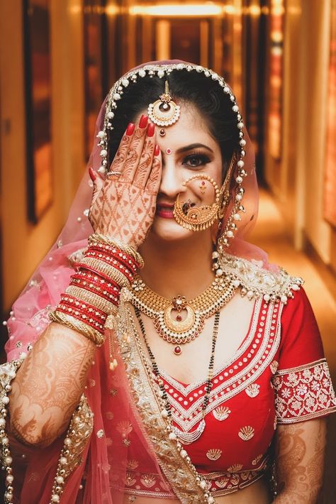 Bride in Amazing Saree Gown. More information on WeddingNet #weddingnet #indianwedding #indianbride #indianwedding #bridallehenga #lehenga #pink #gold #beige #weddinglehenga #weddingsaree #bride #gown  FOLLOW OUR INSTAGRAM @WEDDINGNET Pahadi Nath Design, Pahadi Nath Bridal, Kumaoni Jewellery, Tehri Nath, Garhwali Bride, Bride Pic, Nath Designs, Nath Bridal, Lehenga Pink