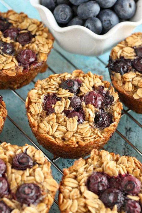 These Baked Blueberry Oatmeal Cups are easy to make and perfect to enjoy for breakfast throughout the week! Blueberry Oatmeal Cups, Baked Blueberry Oatmeal, Blueberry Oatmeal Bake, Breakfast Oatmeal Recipes, Baked Oatmeal Cups, Baked Oatmeal Recipes, Oatmeal Cups, Blueberry Oatmeal, Healthy Blueberry