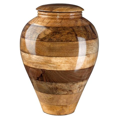 This stunning mango urn is good choice for those who want a beautiful cremation urn for the ashes of their loved one. This urn is made entirely of mango wood and has lots of texture from smooth curves to rough bark. This stunning Wood Cremation Urn makes it a great choice to honor someone who enjoyed nature or who would appreciate keeping it simple. Bandsaw Box, Cremated Remains, Wood Urn, Wooden Urn, Turning Projects, Ceramic Urn, Urn For Ashes, Keepsake Urns, Wood Vase