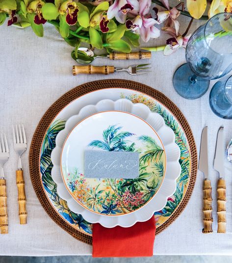 Perfectly capturing the essence of a lush paradise.⁠ At the heart of the decor is a stunning orchid centerpiece, showcasing a mix of vibrant greens and delicate blooms that instantly draw the eye and create a sense of tropical elegance.⁠ ⁠ The bamboo flatware adds a unique touch, effortlessly blending rustic charm with sophistication. Its natural texture complements the theme beautifully, enhancing the organic feel of the setting. Each place setting features hand-painted tropical plates adorn... Tropical Plates, Orchid Centerpiece, Bamboo Flatware, Orchid Centerpieces, Place Setting, Place Settings, Natural Texture, Rustic Charm, Flatware