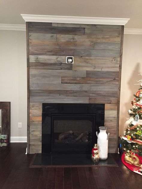 Shiplap stained in grays, browns, and lightly whitewashed. Stained Shiplap Fireplace, Blue Shiplap Fireplace, Blue Shiplap, Fireplace Shiplap, Stained Shiplap, Fireplace Walls, Finish Basement, Fireplace Accent Walls, Gray Shiplap