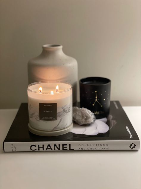 Fashion Books Decor Aesthetic, Chanel Books Decor, Chanel Aesthetic Room Decor, Chanel Room Aesthetic, Book Candle Aesthetic, Chanel Living Room Decor, Book And Candle Aesthetic, Books And Candles Aesthetic, Candle Decor Ideas Living Rooms